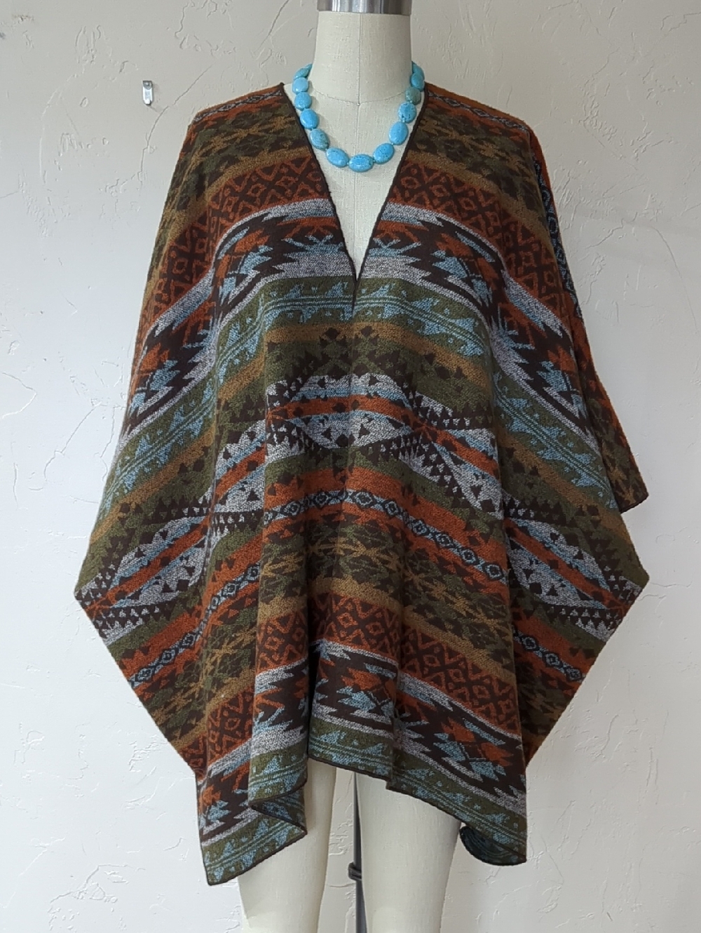Denim & Co. Southwestern Pattern Poncho in Rust, Olive & Sky